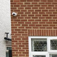 Close up view of home with CCTV camera installed