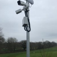 School CCTV installation overlooking golf course