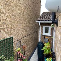 White camera overlooking domestic property