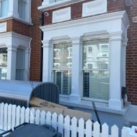 Front view of Georgian house with CCTV security system