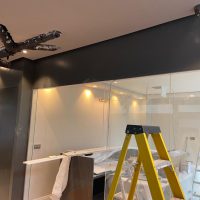 Black CCTV camera over looking construction site