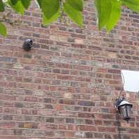 CCTV monitoring system on side of private property