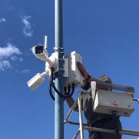Male engineer installing cctv system