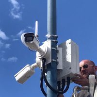 Closeup of engineer installing new ANPR camera