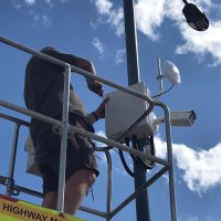 Engineer installing new CCTV system